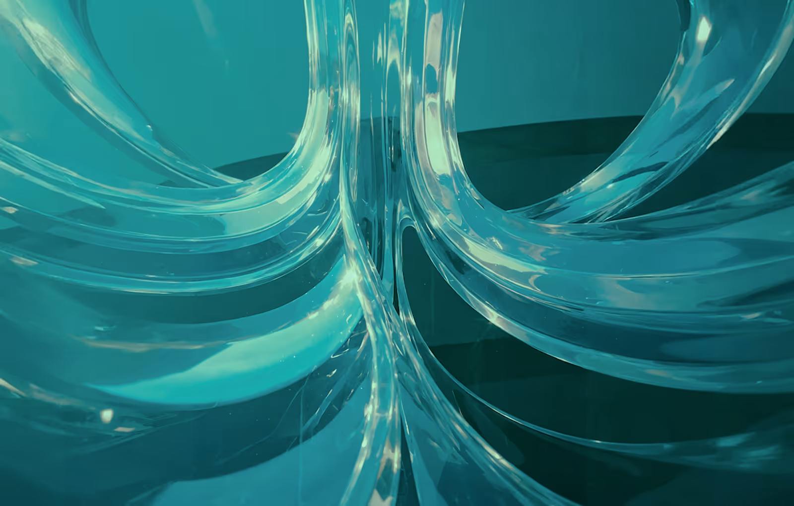 Close-up of intertwined transparent blue glass or plastic tubes on a reflective surface.
